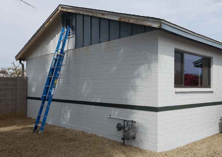 house with a ladder against it