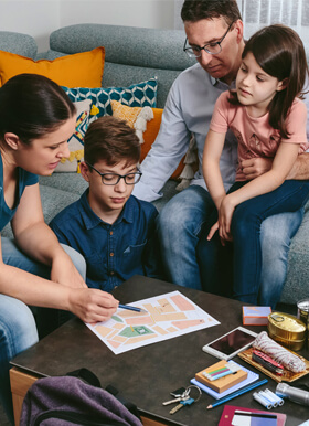 family on couch in living room