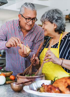 couple cooking a meal together