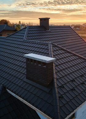 Roof of a house at sunset