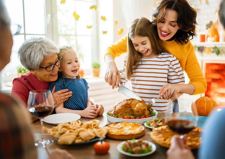 Family carving turkey