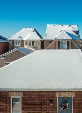 house with snow on roof