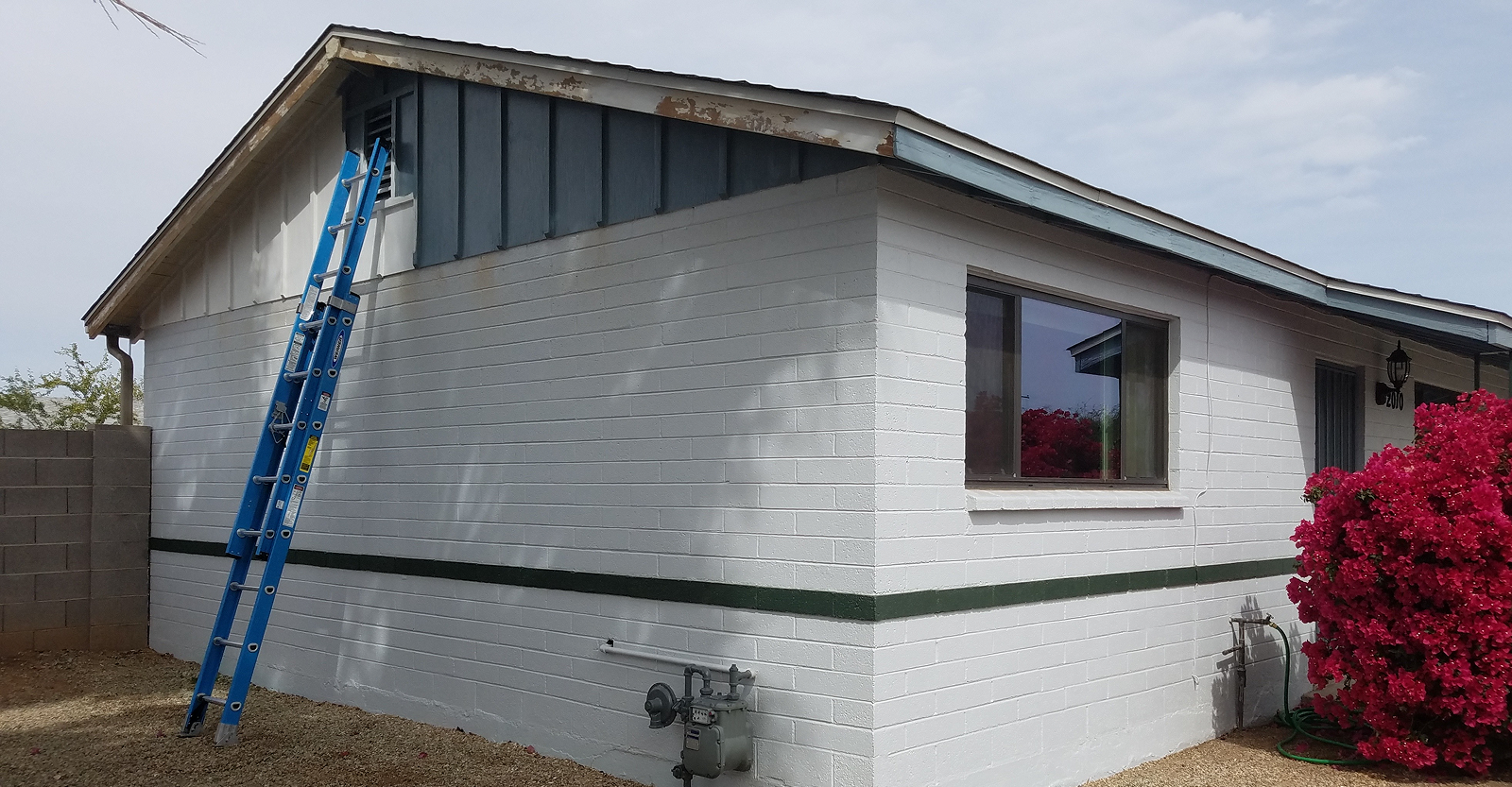 house with a ladder against it