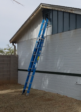 house with a ladder against it